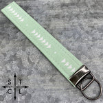 Load image into Gallery viewer, Key Fob Blue Floral Triangle Dot Mint Green