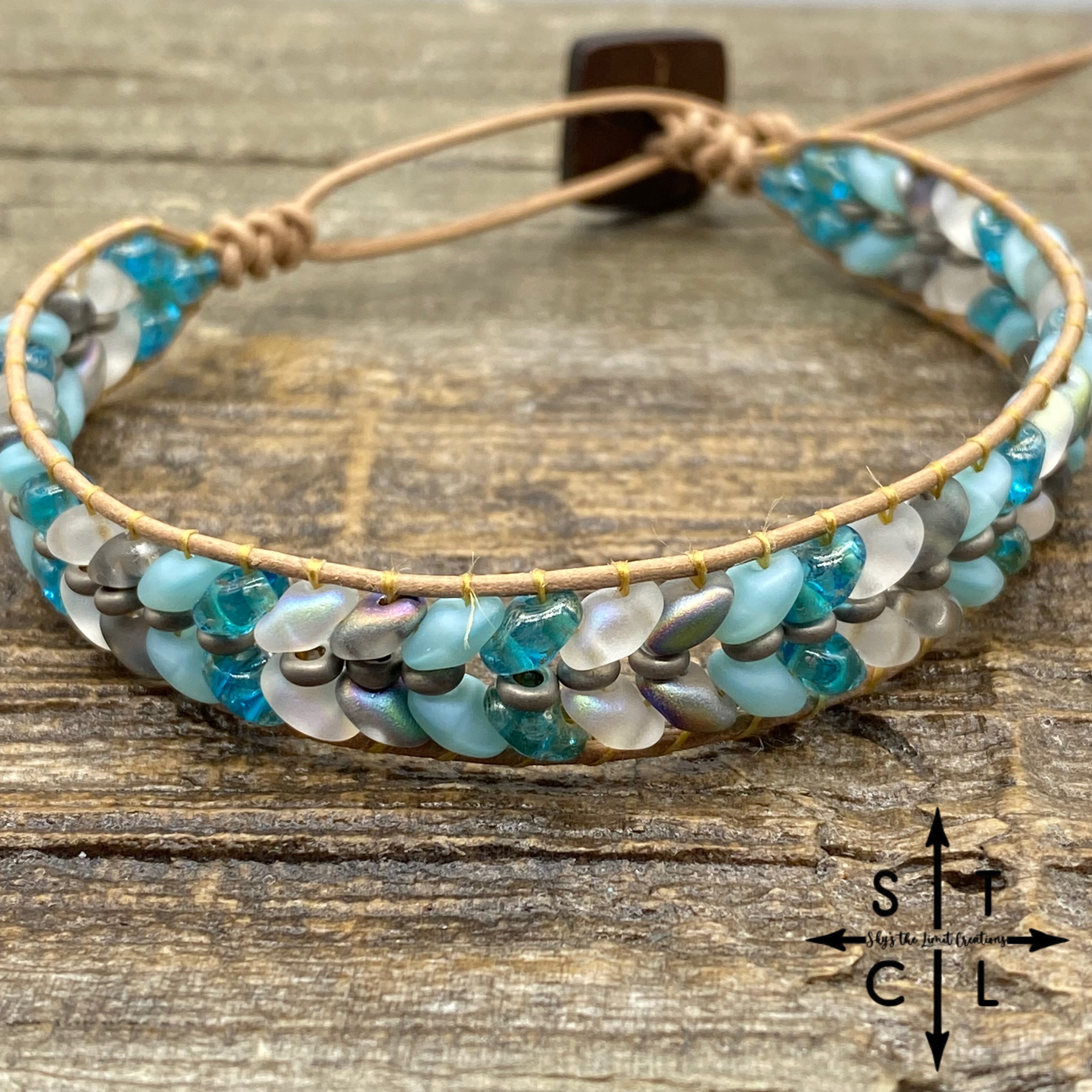 Christine Light Blue Turquoise Peacock Shimmer Clear Bracelet