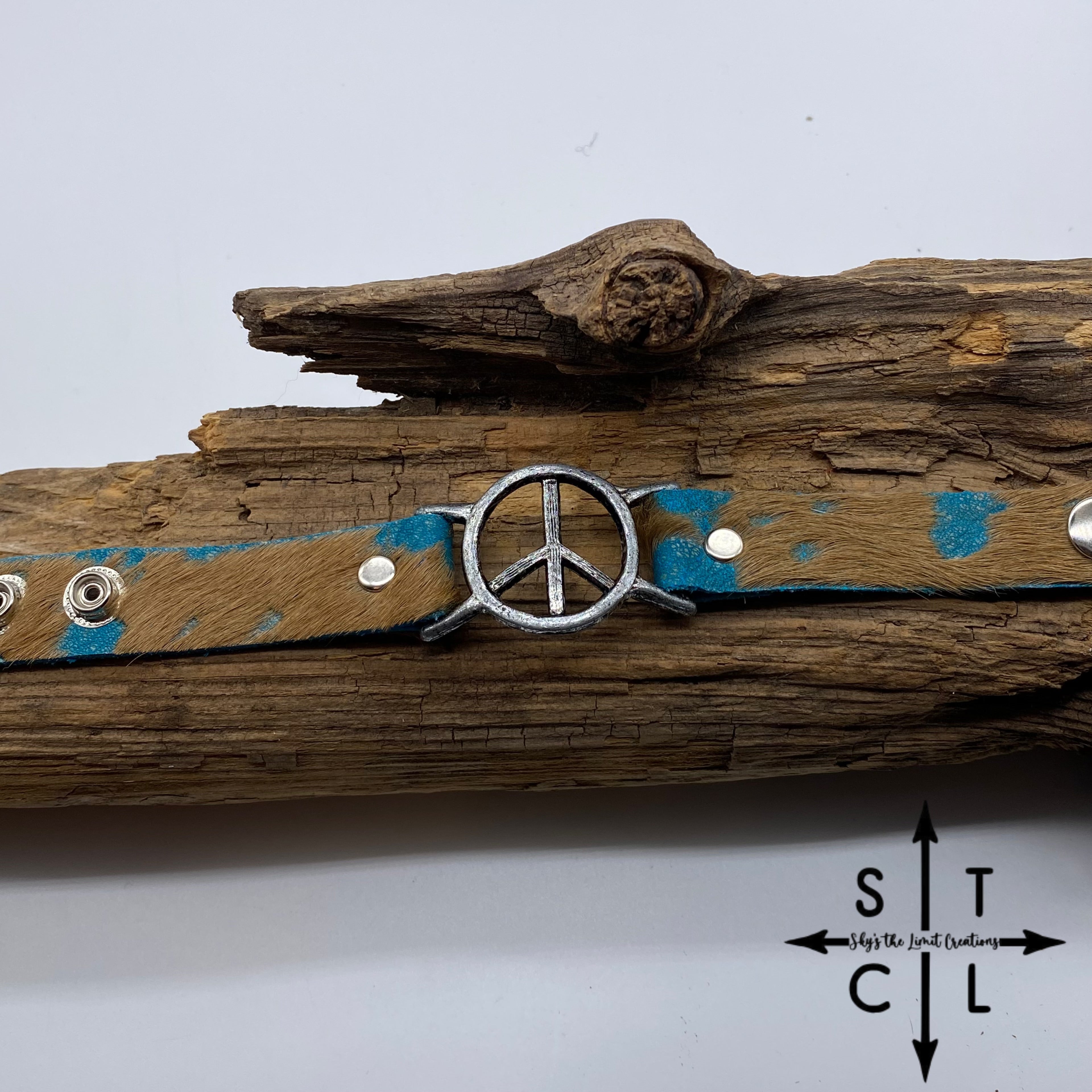 Turquoise On Brown Cowhide Peace Bracelet