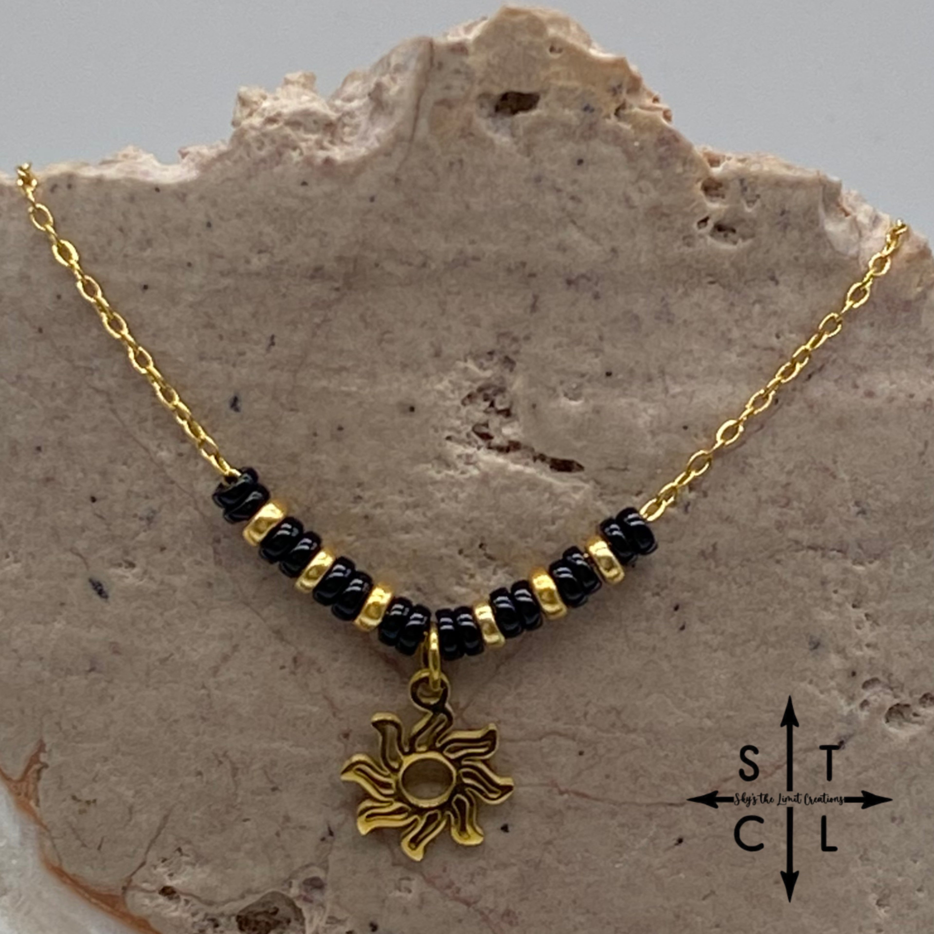 Black Gunmetal Silver Sun Charm Necklace