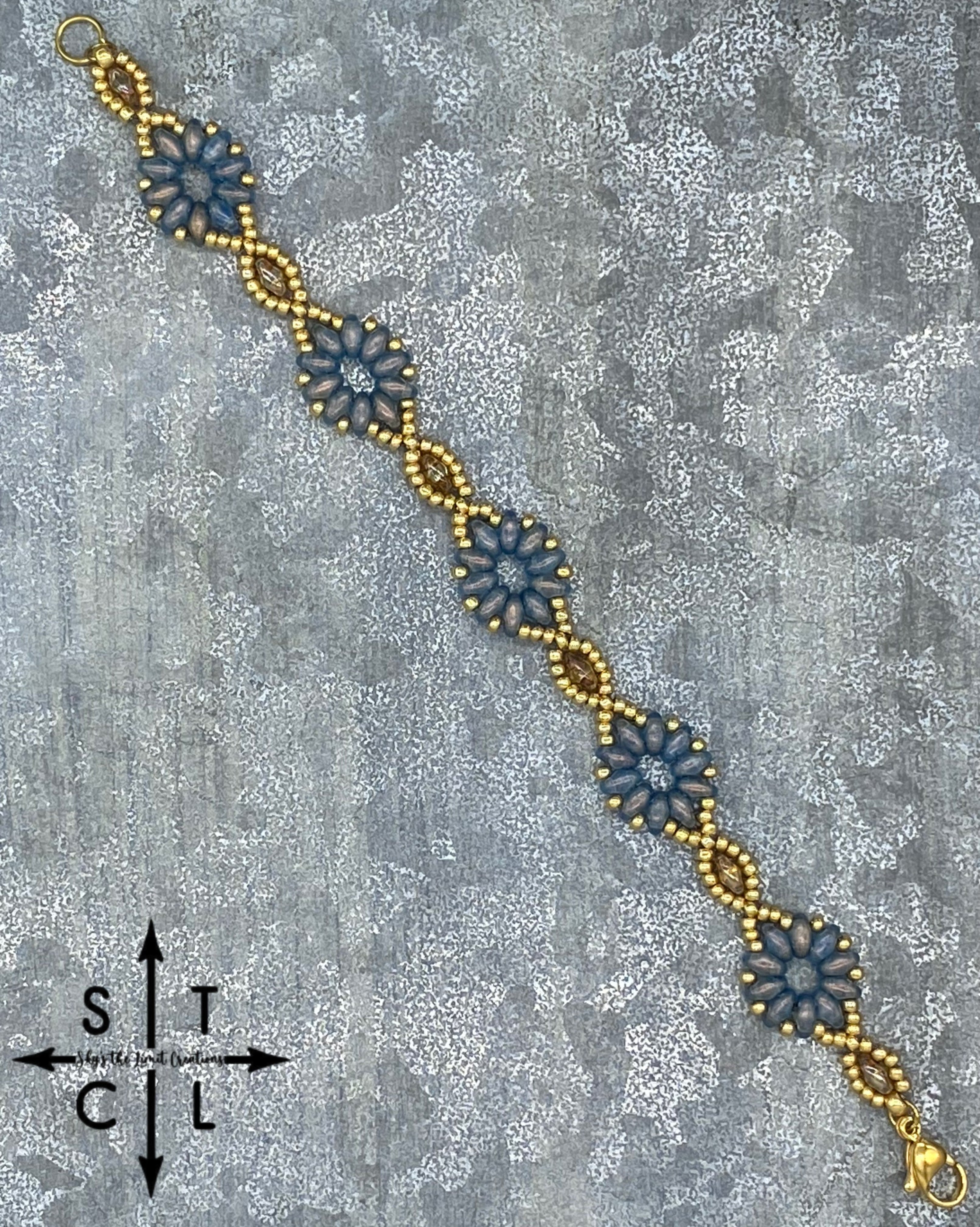 Light Clear Blue Luster Gold Dallis Bracelet