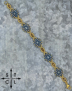 Light Clear Blue Luster Gold Dallis Bracelet