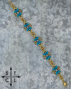 Bright Turquoise Pearl Turquoise Clear Gold Dallis Bracelet