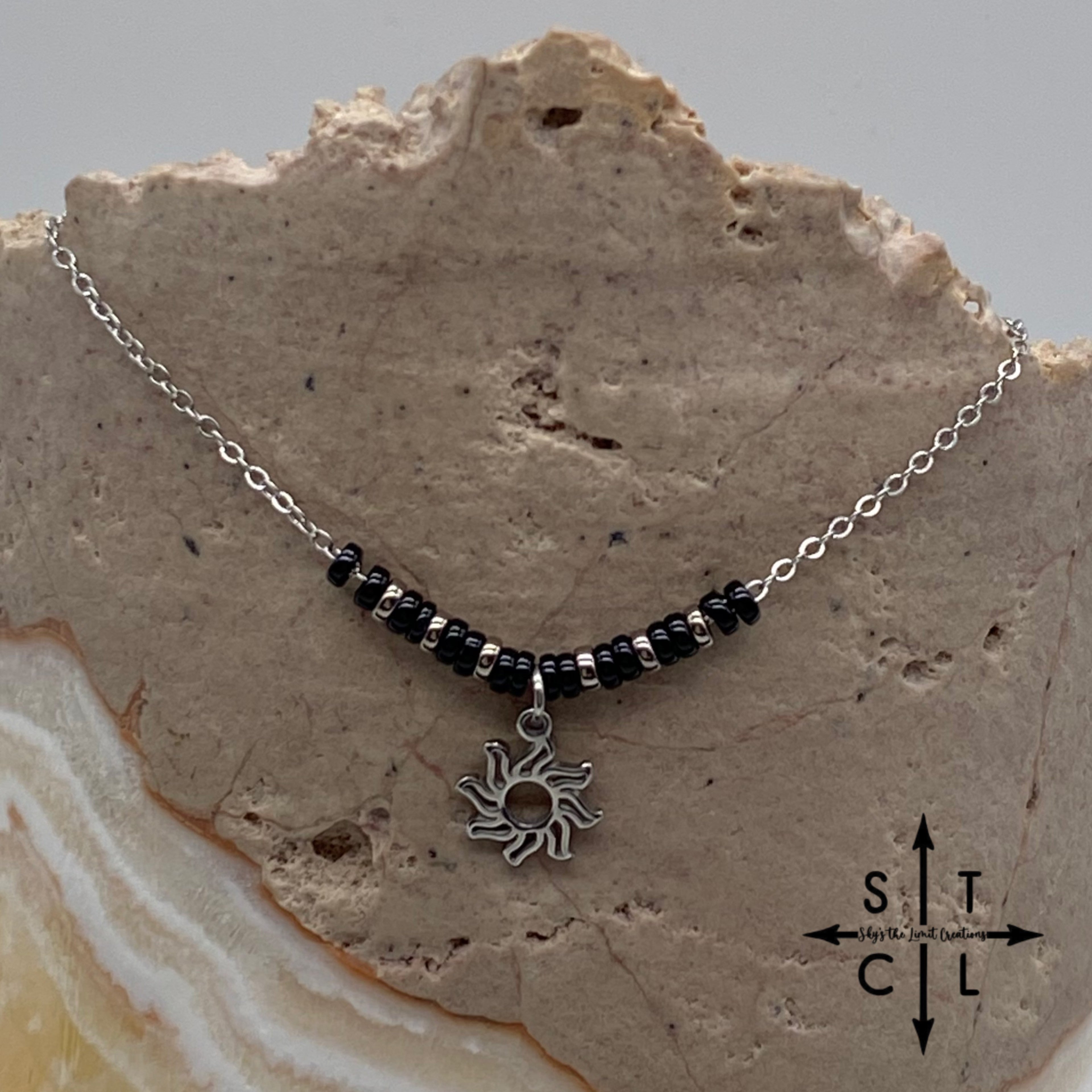 Black Gunmetal Silver Sun Charm Necklace