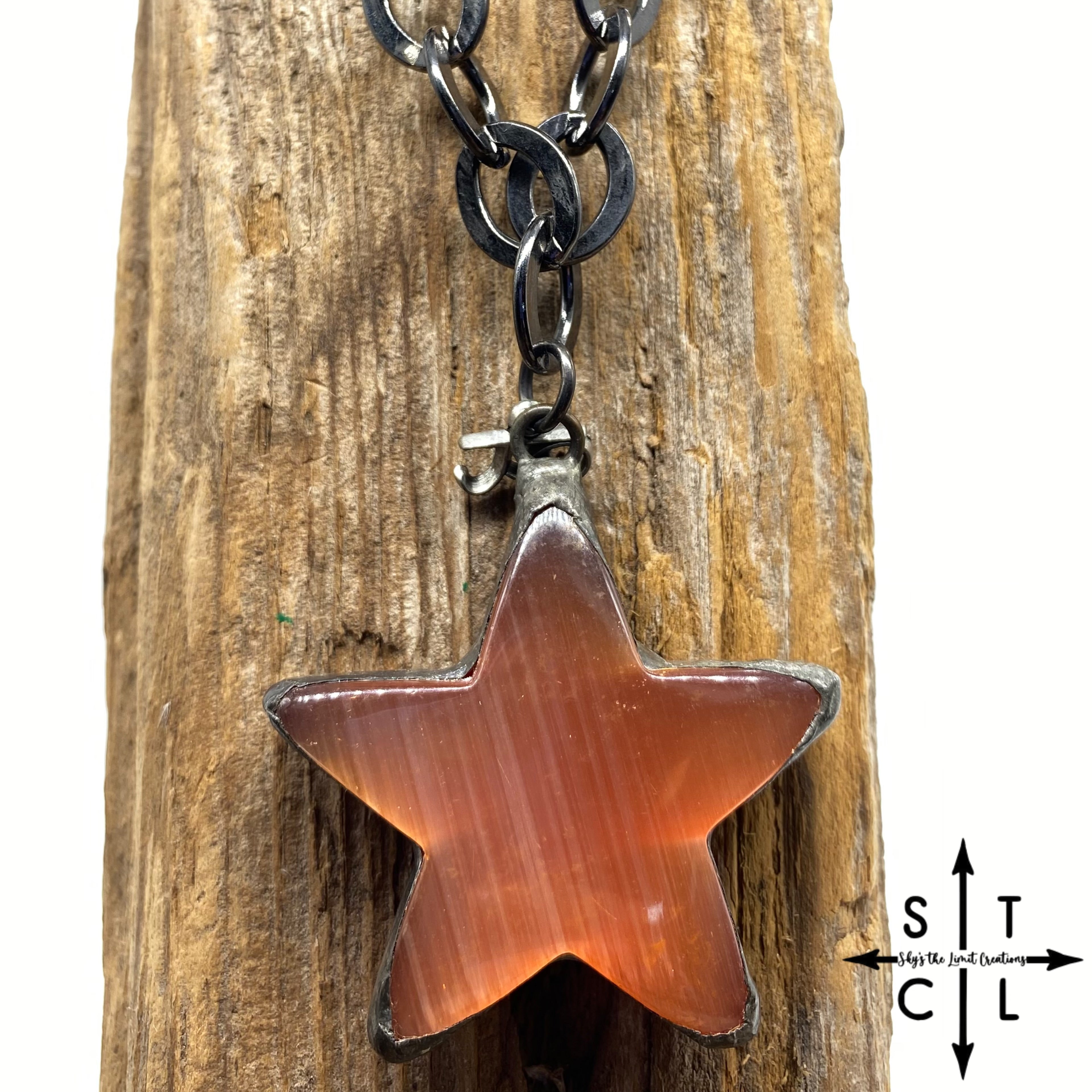 Orange Cats Eye Star Pendent On Chunky Black Gun Metal Chain