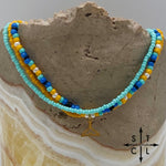 Load image into Gallery viewer, Blue Turquoise Yellow Black White Gold Stretchy Anklet
