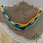 Load image into Gallery viewer, Blue Turquoise Yellow Black White Gold Stretchy Anklet
